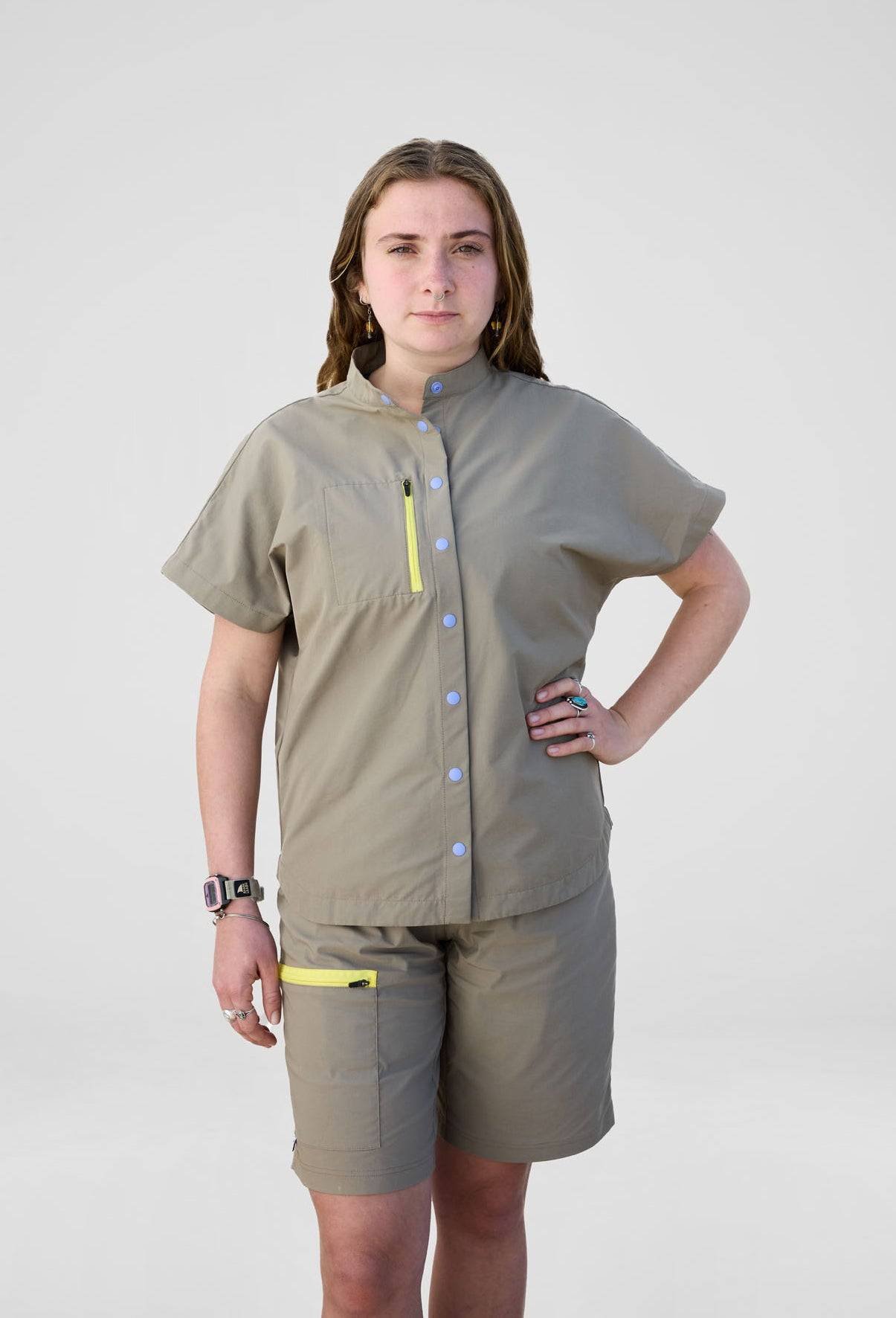 Model is wearing a size M short and blouse