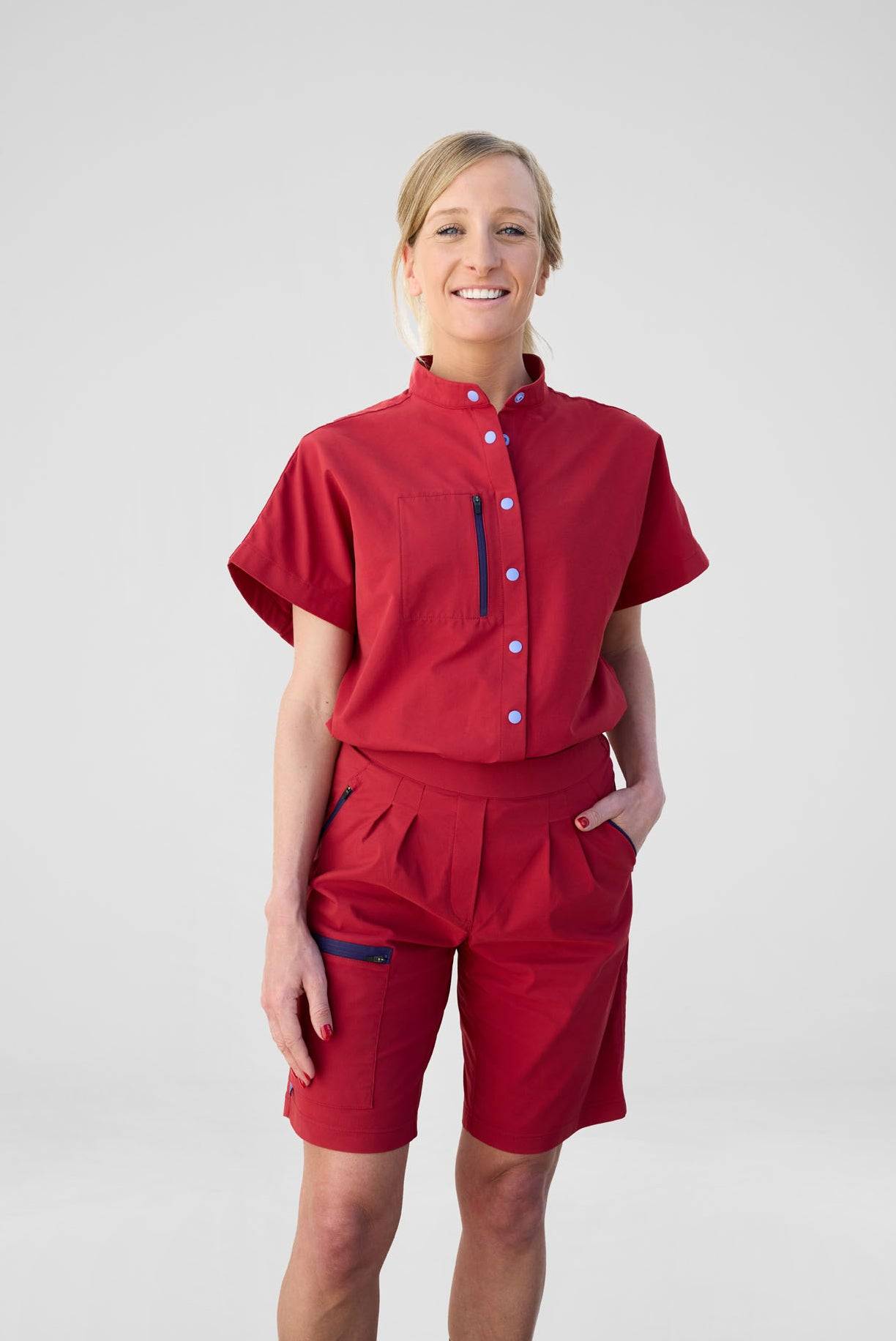 Model is wearing a size S short and blouse